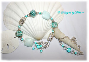Designs by Debi Handmade Jewelry Aloha Collection Mint Green Bracelet and Anklet Set. Features mint green aloha floral rondelles, bali embossed floral rectangular pillow beads, puffy square hemimorphite beads, sterling bead caps, mint green miracle beads, multiple dangles, a petite sterling floral clasp and matching anklet.