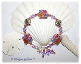 Designs by Debi Handmade Jewelry Aloha Collection Hawaiian Lei Bracelet featuring purple, pink and orange square aloha floral handmade lampwork beads, bali bright silver swirled bead caps and embossed floral diamond-shaped pillows, swarovski crystal violet, rose and padparadscha bicones, multiple dangles and a petite sterling silver flower toggle clasp.