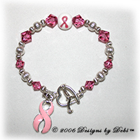 sterling silver and pink Swarovski crystal awareness bracelet with pink ribbon charm