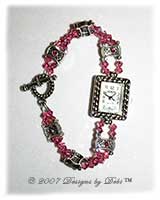 Handmade Rose AB Swarovski crystal watch with a silver rectangle face and round toggle clasp.